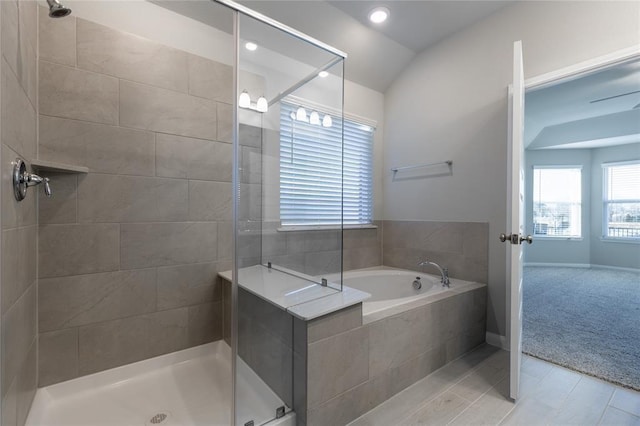 1202 Oak Barrel Run, Richmond, TX 77406 - full bath featuring a shower stall, a bath, recessed lighting, and lofted ceiling
