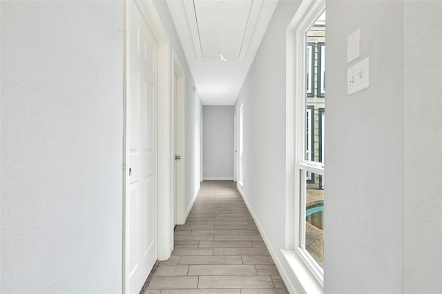 4358 Wildacres Dr, Houston, TX 77072 - corridor featuring attic access and wood finish floors