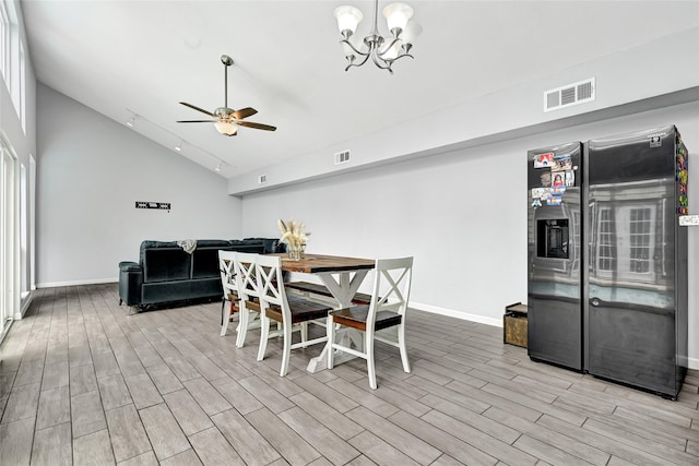 4358 Wildacres Dr, Houston, TX 77072 - dining room featuring wood finished floors, a ceiling fan, a chandelier, and high vaulted ceiling