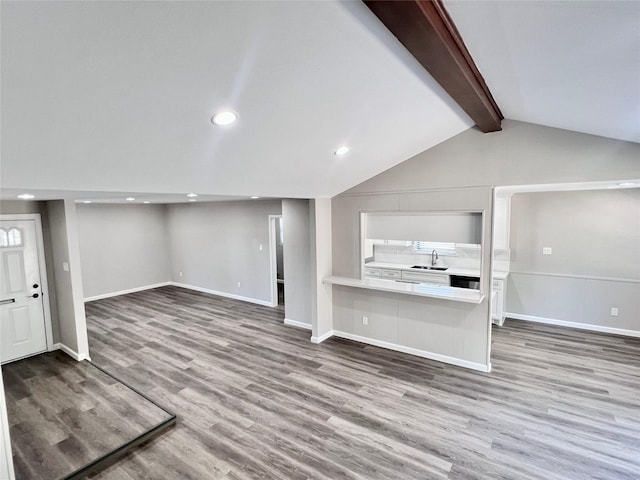 8826 Tanager St, Houston, TX 77036 - unfurnished living room featuring wood finished floors and recessed lighting