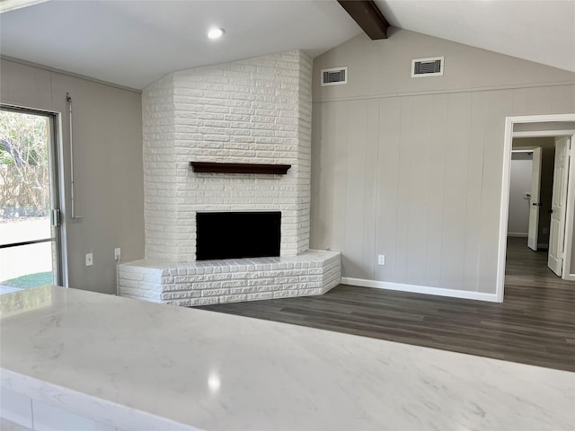 8826 Tanager St, Houston, TX 77036 - unfurnished living room with wood finished floors and a fireplace