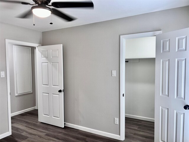 8826 Tanager St, Houston, TX 77036 - unfurnished bedroom featuring dark wood-type flooring, a closet, and ceiling fan