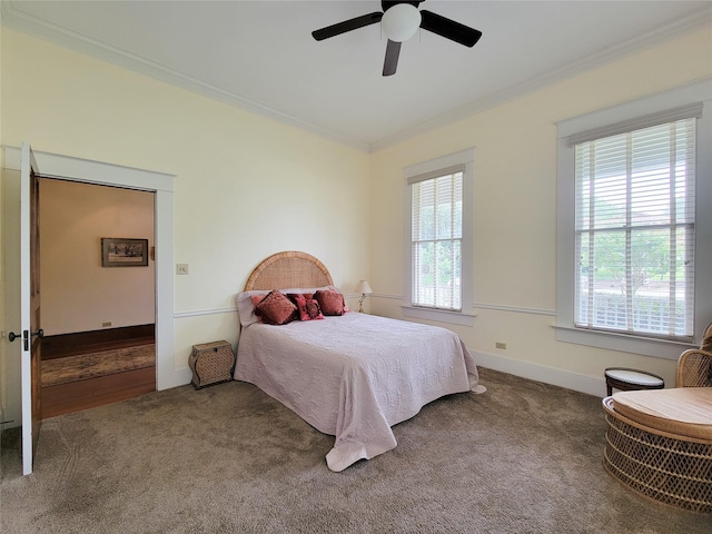 1406 Key St, Brenham, TX 77833 - carpeted bedroom featuring ornamental molding and a ceiling fan