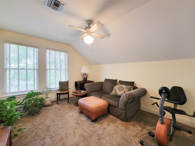 1406 Key St, Brenham, TX 77833 - carpeted living area featuring ceiling fan and lofted ceiling