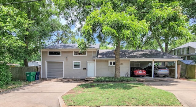 1406 Key St, Brenham, TX 77833 - view of front facade with concrete driveway, entry steps, and an attached carport