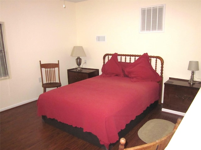 1406 Key St, Brenham, TX 77833 - bedroom with wood finished floors and a heating unit