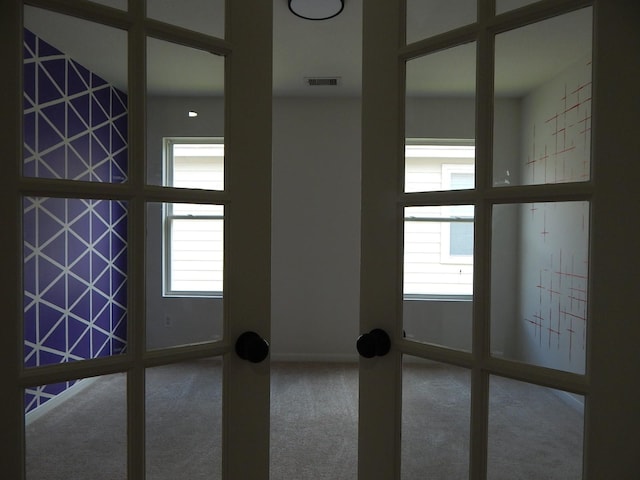 16861 Greenhouse St, Conroe, TX 77385 - carpeted spare room with baseboards