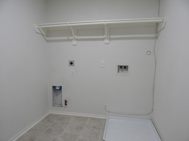 16861 Greenhouse St, Conroe, TX 77385 - washroom featuring hookup for a gas dryer, electric dryer hookup, hookup for a washing machine, and light tile patterned floors