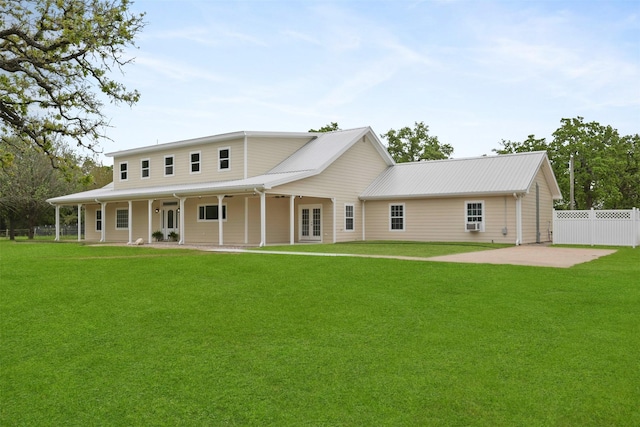 43919 Austin Branch Rd, Hempstead, TX 77445 - rear view of property with french doors, a patio area, and a metal roof