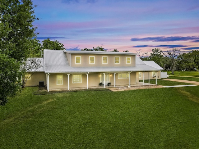43919 Austin Branch Rd, Hempstead, TX 77445 - farmhouse inspired home with a yard, a metal roof, covered porch, and a carport