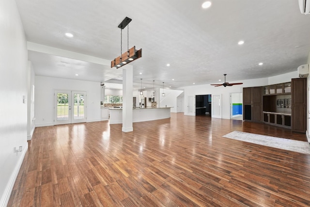 43919 Austin Branch Rd, Hempstead, TX 77445 - unfurnished living room featuring recessed lighting, wood finished floors, ceiling fan, and french doors