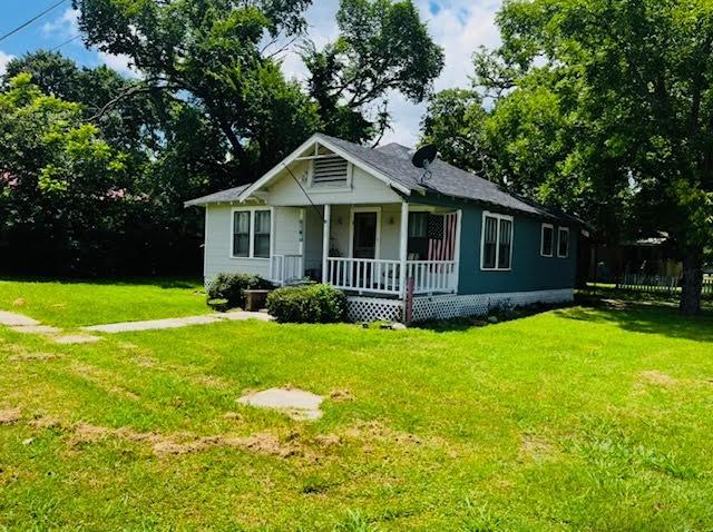17066 State Highway 36 S, Somerville, TX 77879 - bungalow-style home featuring a porch and a front yard