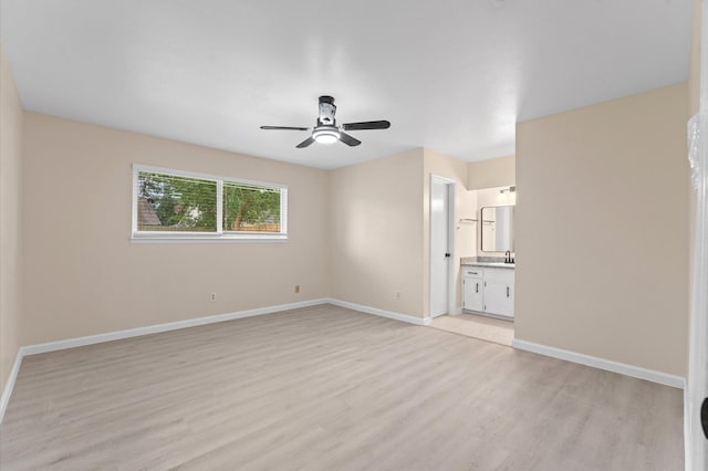 9403 Rentur Dr, Houston, TX 77031 - empty room with a ceiling fan and light wood finished floors