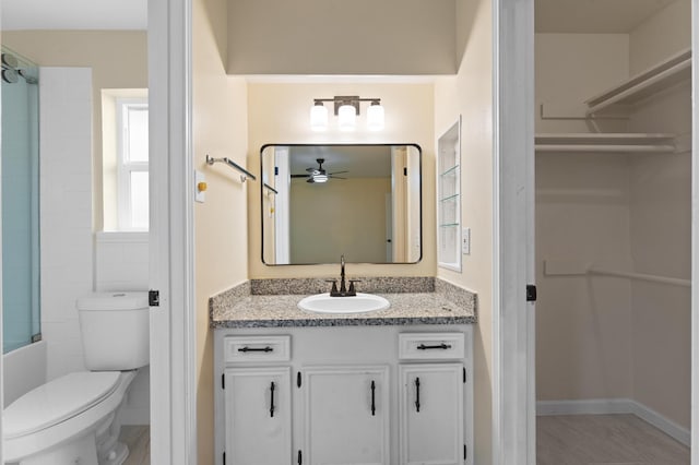 9403 Rentur Dr, Houston, TX 77031 - full bath featuring a ceiling fan and vanity