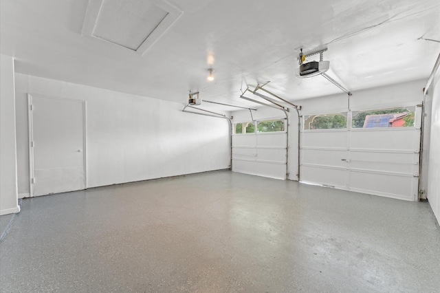 9403 Rentur Dr, Houston, TX 77031 - garage featuring a garage door opener