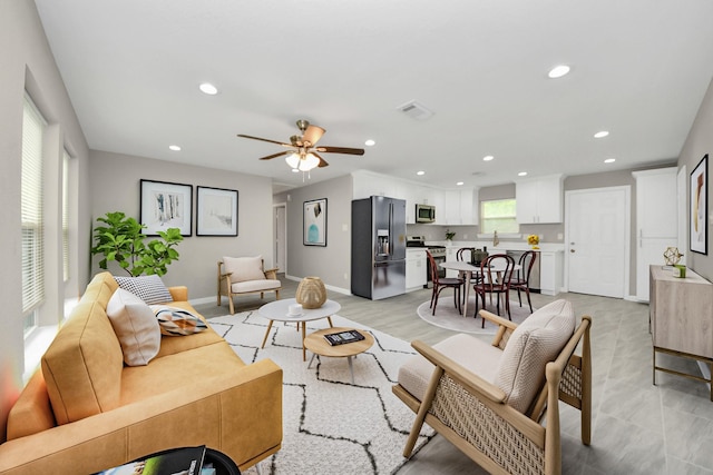 5722 Beldart St, Houston, TX 77033 - living room with recessed lighting and ceiling fan