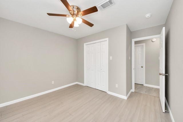 5722 Beldart St, Houston, TX 77033 - unfurnished bedroom with light wood-type flooring, a closet, and ceiling fan
