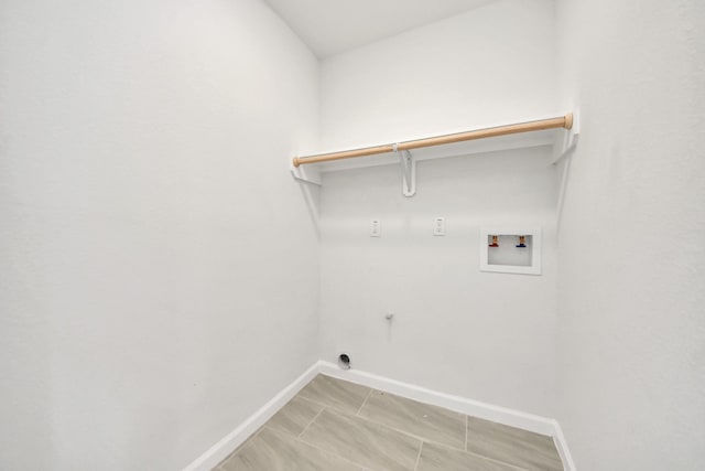 5722 Beldart St, Houston, TX 77033 - laundry room with hookup for a washing machine, electric dryer hookup, and hookup for a gas dryer