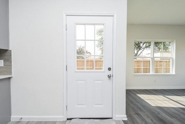 2807 Pine Estate Ln, Houston, TX 77014 - doorway to outside with baseboards and wood finished floors