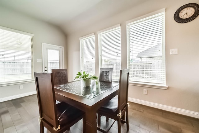 1638 Dominion Heights Ln, Katy, TX 77423 - dining room featuring wood finished floors and vaulted ceiling