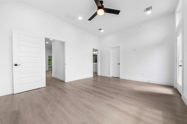 6817 Paris St, Houston, TX 77021 - empty room featuring a ceiling fan, light wood finished floors, and recessed lighting
