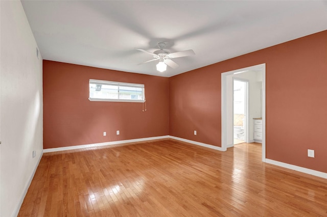 2010 Oceanview Dr, Seabrook, TX 77586 - empty room with a ceiling fan and light wood-style floors