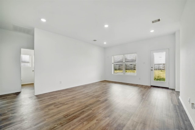 2921 Eden Lake Ln, Katy, TX 77493 - unfurnished room with wood finished floors and recessed lighting