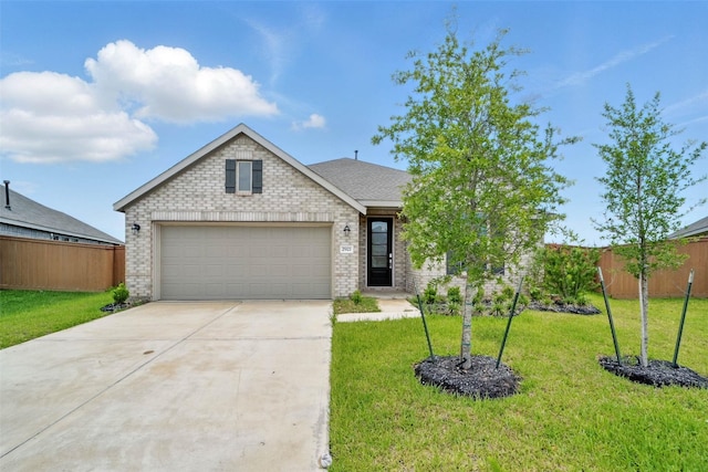 2921 Eden Lake Ln, Katy, TX 77493 - view of front facade featuring brick siding, concrete driveway, a garage, and a shingled roof