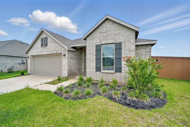 2921 Eden Lake Ln, Katy, TX 77493 - view of front of home featuring a garage, concrete driveway, brick siding, and roof with shingles