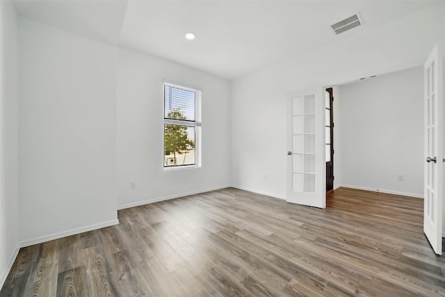 2921 Eden Lake Ln, Katy, TX 77493 - unfurnished room with french doors and wood finished floors