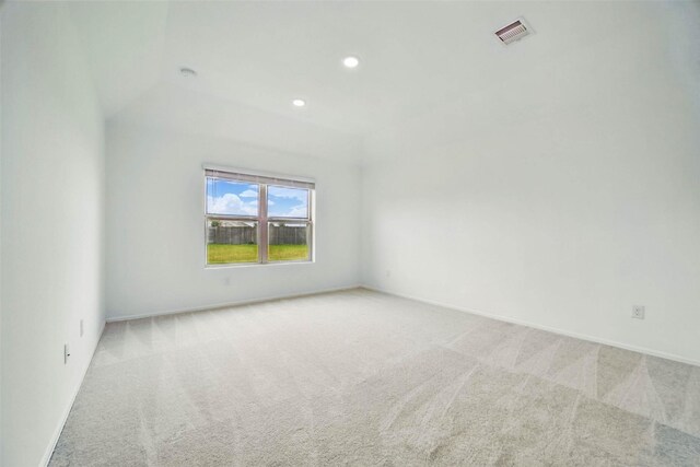 2921 Eden Lake Ln, Katy, TX 77493 - empty room with light colored carpet and recessed lighting