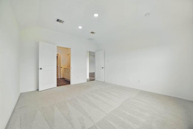 2921 Eden Lake Ln, Katy, TX 77493 - carpeted spare room with vaulted ceiling and recessed lighting