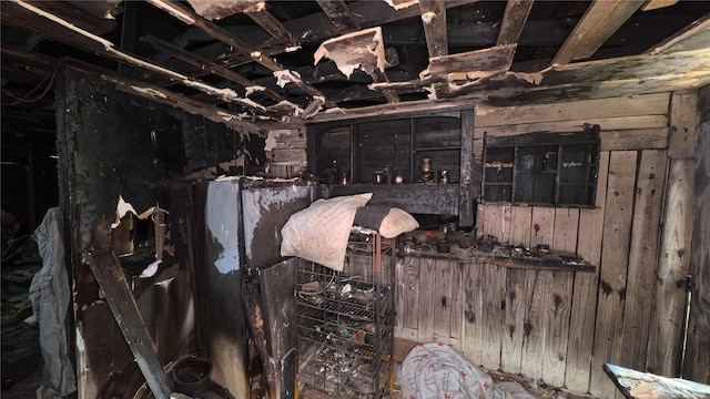 1205 Preston St, Richmond, TX 77469 - miscellaneous room with wooden walls