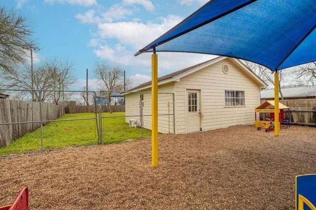 402 W Converse St, Weimar, TX 78962 - back of property featuring a playground