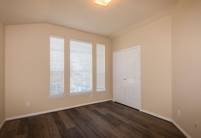 8603 E Windhaven Terrace Trl, Cypress, TX 77433 - unfurnished bedroom featuring dark wood-style floors and a closet