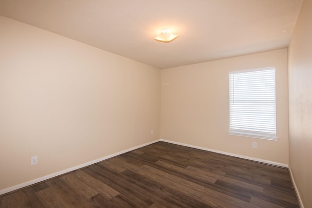 8603 E Windhaven Terrace Trl, Cypress, TX 77433 - spare room featuring dark wood finished floors