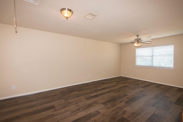 8603 E Windhaven Terrace Trl, Cypress, TX 77433 - unfurnished room with ceiling fan and dark wood finished floors