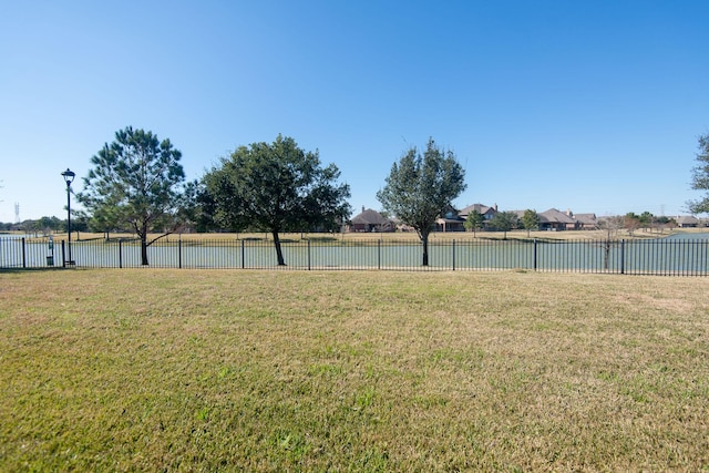 8603 E Windhaven Terrace Trl, Cypress, TX 77433 - view of yard with a water view