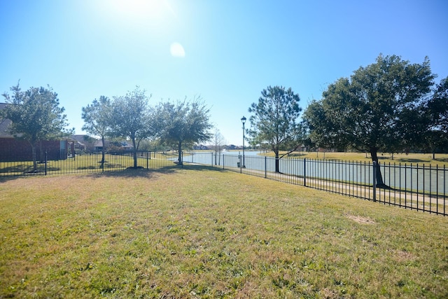 8603 E Windhaven Terrace Trl, Cypress, TX 77433 - fenced backyard with a water view
