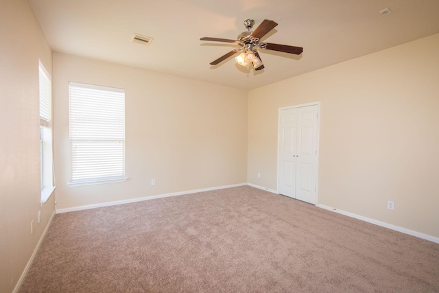 8603 E Windhaven Terrace Trl, Cypress, TX 77433 - carpeted spare room with ceiling fan and baseboards