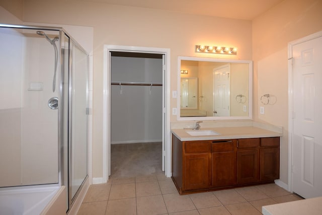 8603 E Windhaven Terrace Trl, Cypress, TX 77433 - full bath featuring a stall shower, vanity, and tile patterned flooring