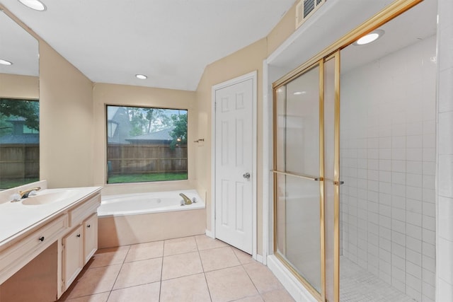 4327 Long Glen Dr, Houston, TX 77339 - bathroom with vanity, a garden tub, a stall shower, tile patterned flooring, and recessed lighting