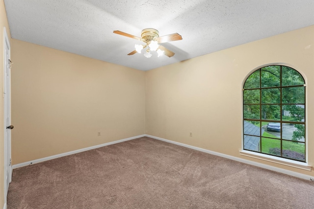 4327 Long Glen Dr, Houston, TX 77339 - carpeted spare room featuring a ceiling fan and a textured ceiling