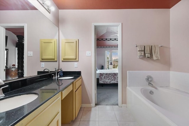 10819 Belle Haven Dr, Houston, TX 77065 - bathroom featuring ensuite bath, tile patterned floors, double vanity, and a bath