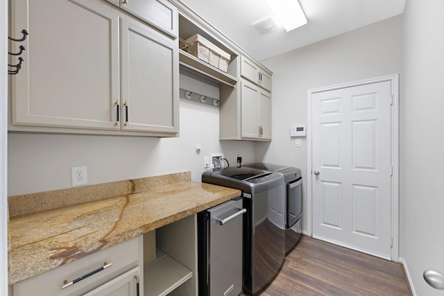 19610 Blushing Meadow Dr, Cypress, TX 77433 - laundry area with independent washer and dryer, cabinet space, and dark wood finished floors