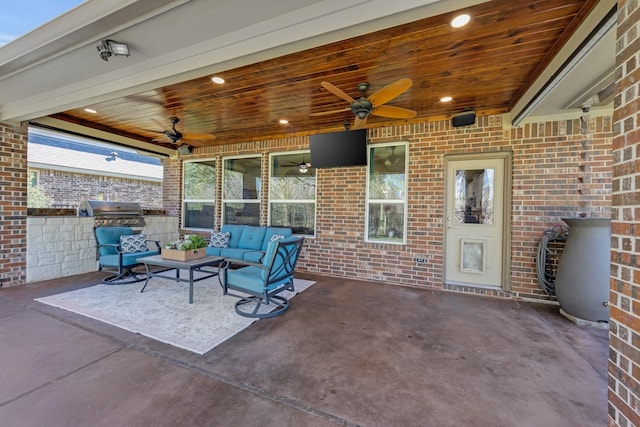 19610 Blushing Meadow Dr, Cypress, TX 77433 - view of patio with a ceiling fan, exterior kitchen, and outdoor lounge area