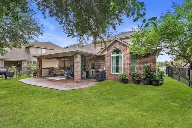 19610 Blushing Meadow Dr, Cypress, TX 77433 - back of house with brick siding, a fenced backyard, a patio area, and roof with shingles