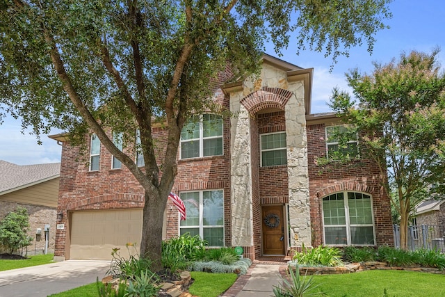19610 Blushing Meadow Dr, Cypress, TX 77433 - traditional home with concrete driveway, stone siding, brick siding, and a garage