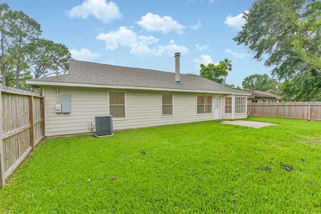 622 Magnolia Bend St, League City, TX 77573 - rear view of house with a fenced backyard, a patio, and a shingled roof