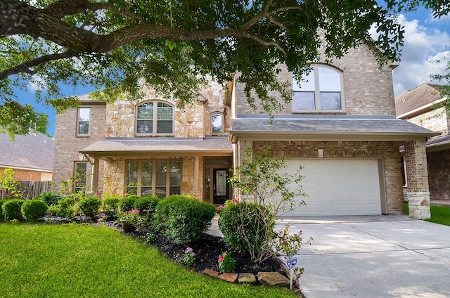25619 Tower Side Ln, Katy, TX 77494 - view of front of home featuring driveway and a garage